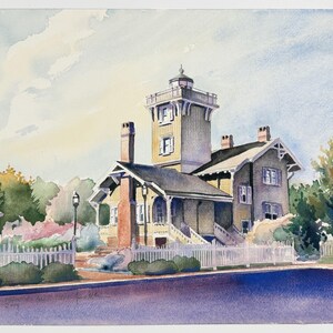 May include: Watercolour painting of a historic building with a tower, set against a blue sky. The building is painted in shades of yellow and grey, with a white picket fence and lush greenery in the foreground. A flag waves in the distance.