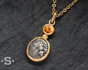 Pendant authentic ancient Greek coin with sapphire. Gold 900 setting. Coin pendant.