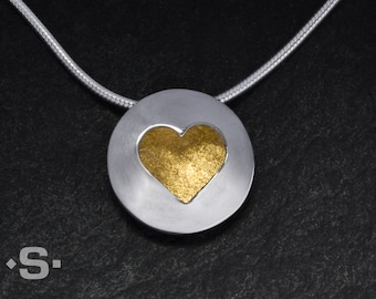 Heart pendant "Look into my heart" in 999 gold and silver. Heart necklace. With gold from German rivers. Goldsmith's work.