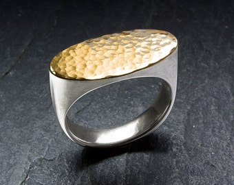 Elegant silver signet ring with hammered 18 k gold surface. Handmade goldsmith work. Men, women.