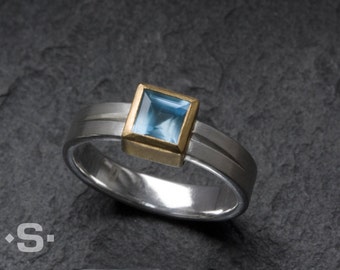 Ring with Aquamarine set in a gold 900 bezel. Handmade jewelry. Unique Engagement ring.