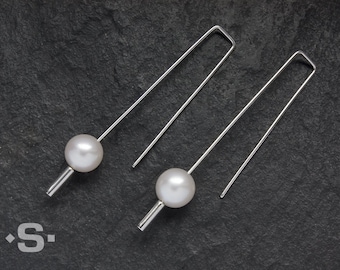 Earrings, hanging with real pearls. Silver 925. Wedding, bridal jewelry. Goldsmith's work.