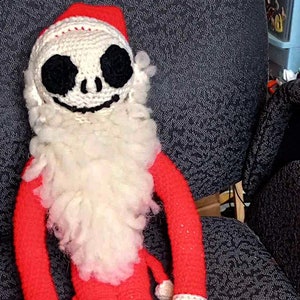30" tall Jack Skellington in his Santa suit amigurumi plushie.