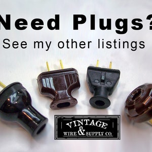 May include: Four vintage electrical plugs in black and brown with gold prongs. The plugs are on a white surface. The text "Vintage & Wire Supply Co." is visible in the lower right corner of the image.