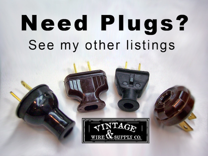 May include: Four vintage electrical plugs in black and brown with gold prongs. The plugs are on a white surface. The text "Vintage & Wire Supply Co." is visible in the lower right corner of the image.