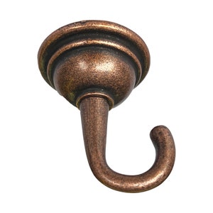 May include: A decorative, antique-style, copper-toned metal hook with a rounded top and a curved hook. The hook is designed for hanging items from a ceiling.