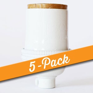 May include: Five pack of white ceramic light bulb sockets with a brown cardboard top. The sockets are stacked on top of each other and have a 5-pack label.
