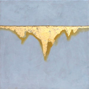 May include: Abstract painting with a light gray background and a gold metallic drip effect. The gold paint is applied in a thick, textured layer, creating a sense of movement and depth.