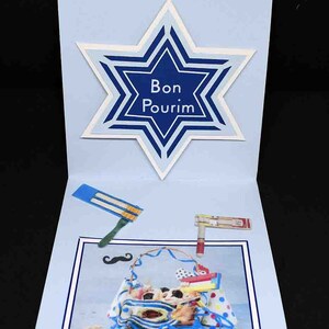 Tarjeta para fiestas judías, Happy Purim, Estrella de David, canasta y matracas.