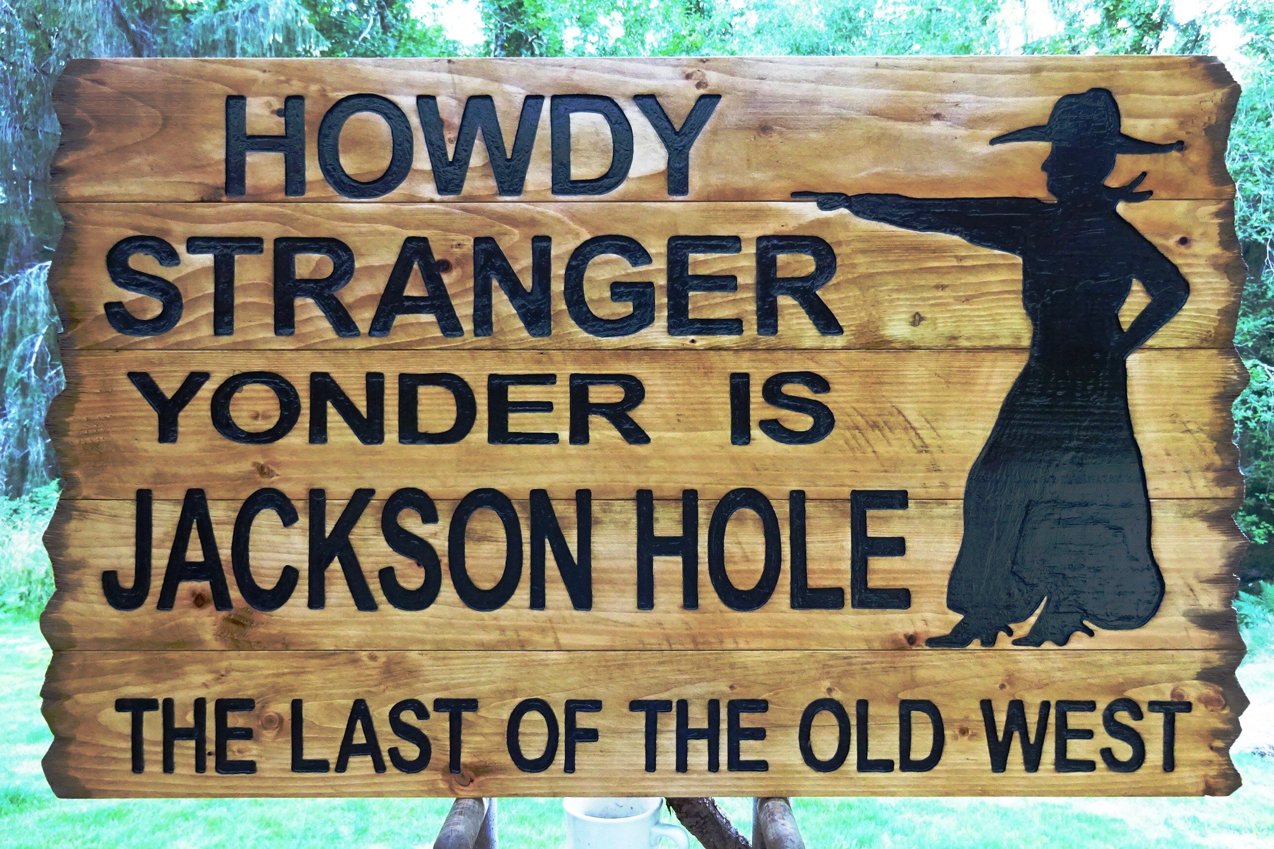 JACKSON HOLE Sign Iconic Wyoming State Scenic Attraction. Road