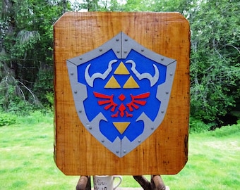 Legend of Zelda HYLIAN SHIELD, fantasy adventure game sign. Hand carved routed painted 3D Triforce emblem with raised steel rivets sos494