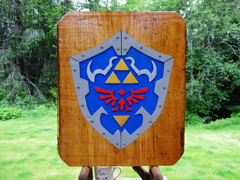 Legend of Zelda HYLIAN SHIELD, fantasy adventure game sign. Hand carved routed painted 3D Triforce emblem with raised steel rivets sos494 image 1