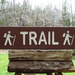 TRAIL DIRECTION with right hikers Park road cabin lodge campground sign. Hand carved routed light reflective white letters & hikers sp247+