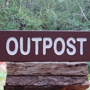 Park style OUTPOST sign.  White letters on a brown sign Cabin lodge campground sign. Hand carved routed painted reflective letters MAN045H+