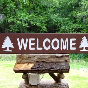 WELCOME park style sign, trail road cabin refuge lodge campground sign. Hand carved routed light reflective lettering and symbols ma022R+