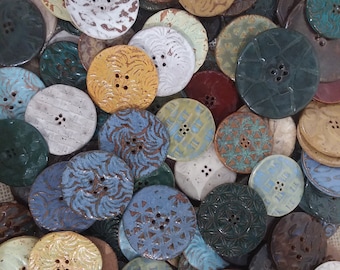 Hand made high fired ceramic buttons in assorted colors.  Very strong.  Hand wash only. Most buttons are 1 1/2 inches.