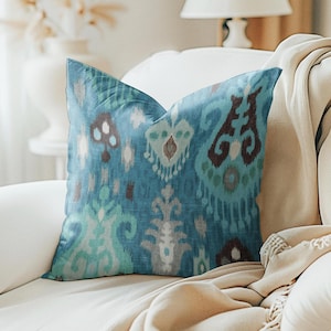 Funda de almohada Artistry, almohada decorativa de tela de barro, almohada tribal boho ikat en turquesa y verde azulado