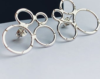 Silver hoop stud earrings, handmade sterling silver stud hoop design earrings, made using traditional silversmith techniques in the UK