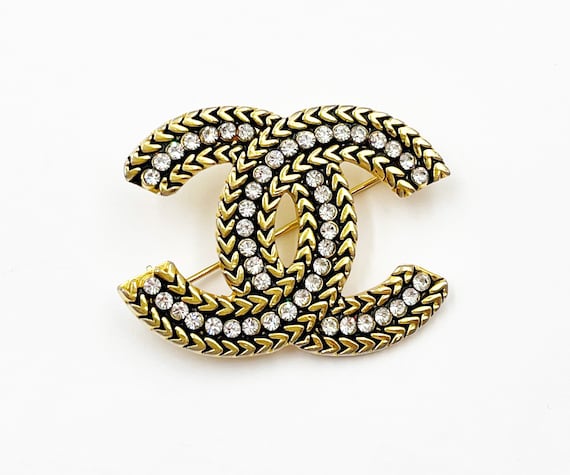 Chanel brooch in black - Gem