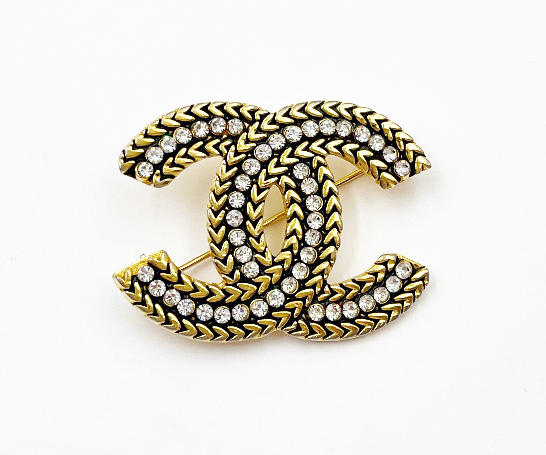 Chanel CC logo gold metal black enamel brooch