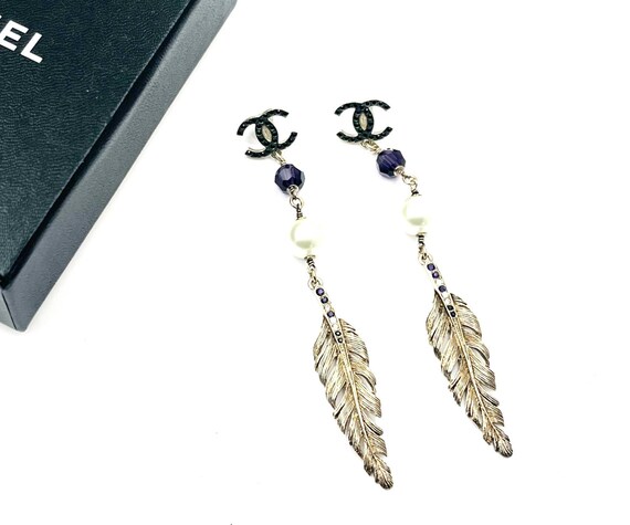 Chanel feather earrings shop