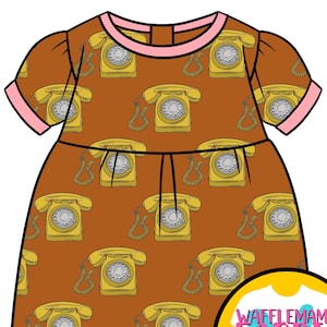 May include: A brown dress with a pattern of yellow rotary phones. The dress has short sleeves and a pink trim. The text "WAFFLEMAMA FABRIC DESIGN" is on a yellow circle in the bottom right corner.