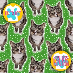 May include: A seamless pattern featuring a tabby cat with white markings on a green background with white polka dots. The pattern includes the text "WAFFLE MAMA FABRIC DESIGN" and "10"x"10".