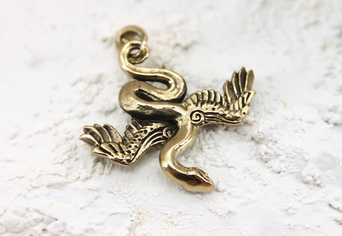 Winged snake bronze pendant necklace | Etsy