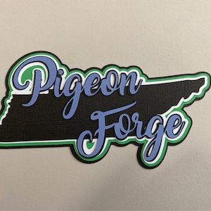 May include: A black and green outline of the state of Tennessee with the words "Pigeon Forge" in blue cursive lettering.