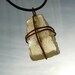 Thames Glass Pendant – a mudlarking find selected from The River Thames foreshores tied up like a parcel with recycled copper wire