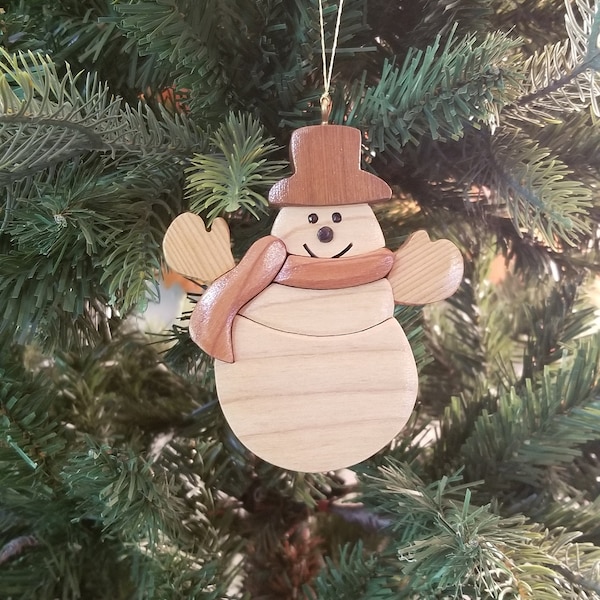 SNOWMAN CHRISTMAS ORNAMENT Intarsia Wood Carving.  This collectible is endearing with it's charming expression and detail.