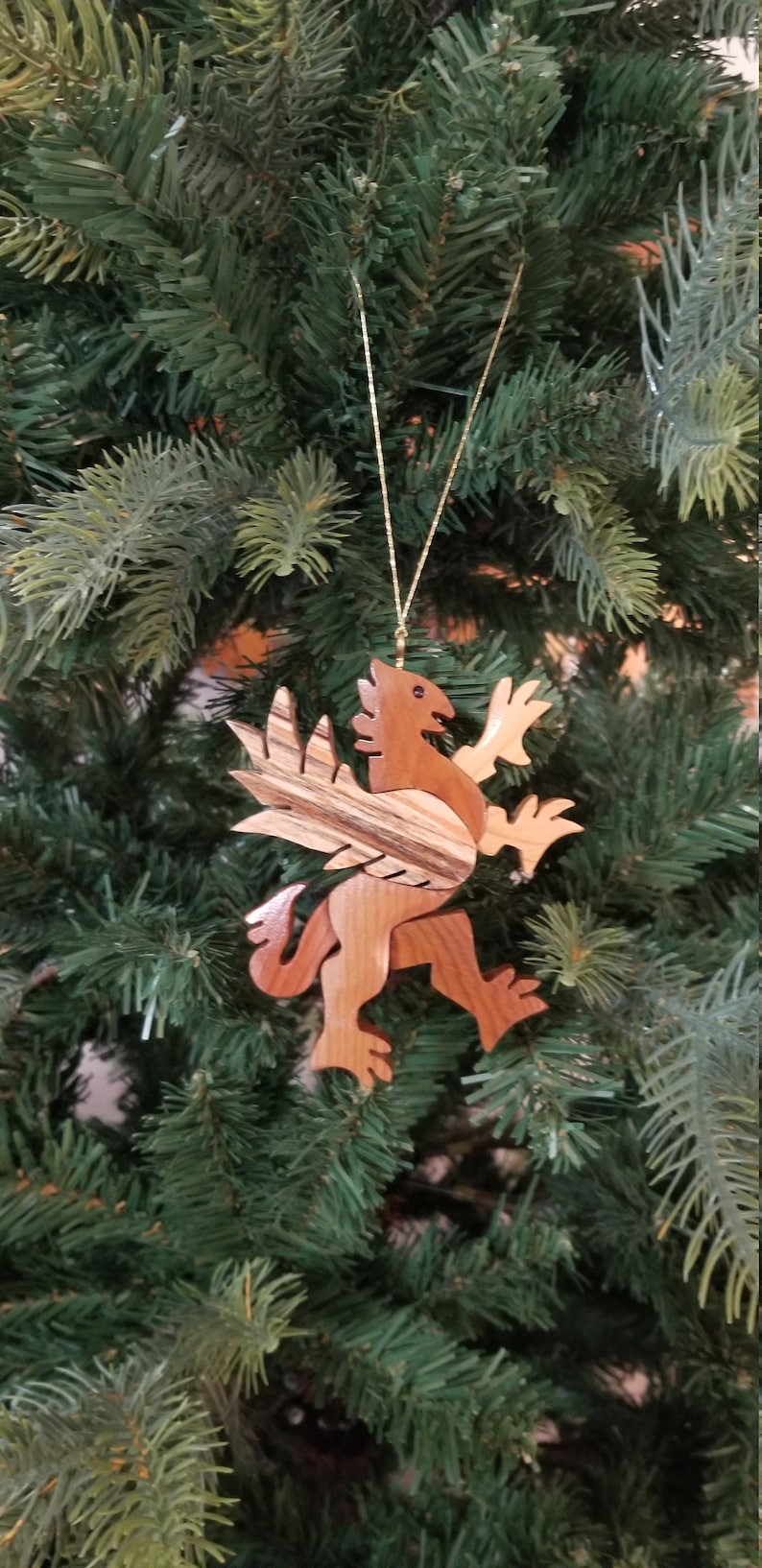 GRIFFIN CHRISTMAS ORNAMENT A legendary mythical creature with body of a lion and and head, and wings of a bird. image 1