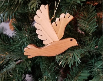 DOVE CHRISTMAS Ornament. On sale until sold out.. Trim the tree with meaningful symbols like our peace dove ornament.
