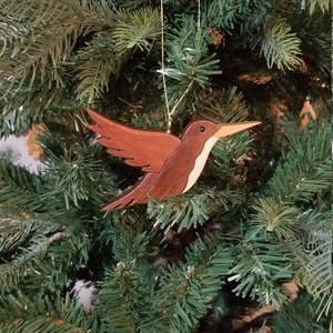 HUMMINGBIRD CHRISTMAS ORNAMENT.  Beautifully depicted, with lots of personality for the bird lover on your holiday list.