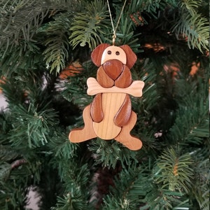 DOG with BONE Christmas ORNAMENT Carving.  Dog lovers will cherish this charming and endearing pup.