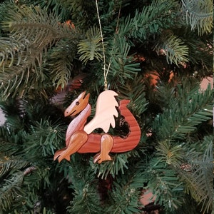 DRAGON CHRISTMAS ORNAMENT.  Whimsical yet festive, a miniature work of art.  Perfect for the Chinese New Year