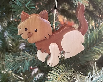 CAT CHRISTMAS ORNAMENT Wood Carving.  Beautifully depicted cat is a fun loving ornament.