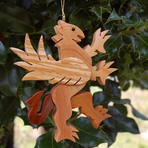 GRIFFIN CHRISTMAS ORNAMENT A legendary mythical creature with body of a lion and and head, and wings of a bird. image 3