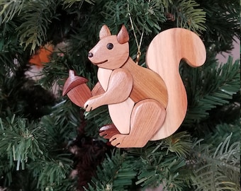 SQUIRREL WITH ACORN  New for 2022!  This squirrel ornament is a cheerful forest critter, sure to bring a smile.