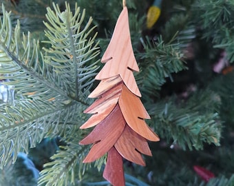 TREE CHRISTMAS ORNAMENT.  A festive miniature work of art.  What can be better than putting a tree on your tree.  Ready for trimming!