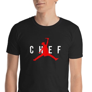 Funny Restaurant Chef - Jumping Chef Knife Logo T-Shirt Parody Logo | Cook with Knife and Chef Hat Red White