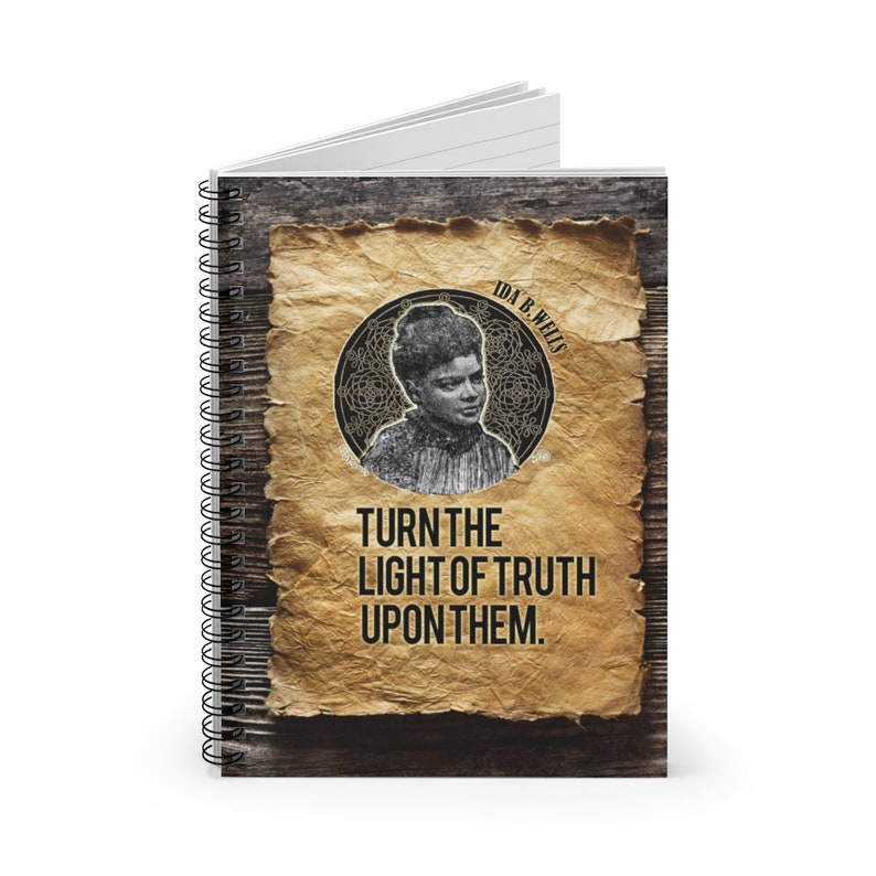 May include: A spiral bound notebook with a vintage-style image of Ida B. Wells. The image is on a brown paper background with the text "TURN THE LIGHT OF TRUTH UPON THEM."