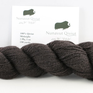 May include: A skein of dark brown 100% Qiviut yarn called "Midnight" by Nunavut Qiviut. The skein is 2 ply, 1 oz, and 190 yards.