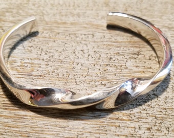 Heavy Cast solid Sterling silver bracelet with twist. Men's size 10. High polish or Matte finish. Made to order.