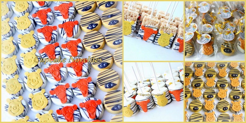May include: A collection of Winnie the Pooh themed party favors, including chocolate-covered Oreos, Rice Krispie treats, and lollipops. The treats are decorated with Winnie the Pooh and zebra print designs.