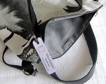 Mini sac en coton à motifs, avec bandoulière double cuir.