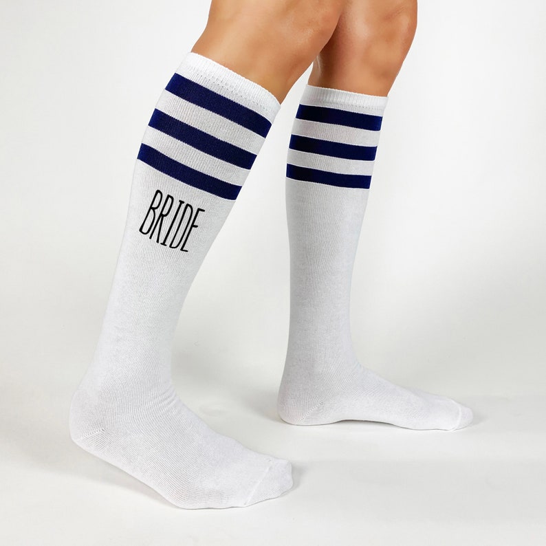 Bride or brides babe custom printed on the sides of each pair of striped knee high socks.  Several stripe colors to choose from make these your bridesmaid proposal socks they can wear to your bachelorette party.