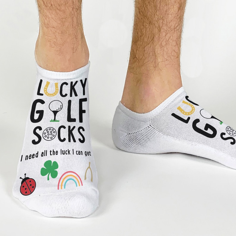 These cotton blend 1/2 cushion no show socks are digitally printed on the top of the socks with a funny lucky golf sock design. Fun golf socks with cotton comfort, keeping feet happy through a round of golf.