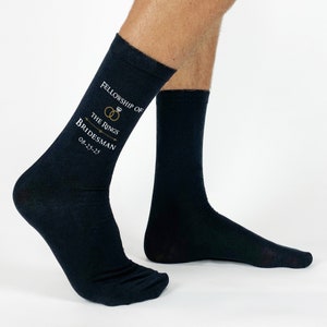 Available in flat knit dress socks; Navy, Black, Charcoal, and Purple.
Personalized for the Bridesman along with the wedding date.