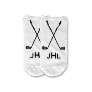 Comfy custom printed and personalized with your name or initials these golf theme design digitally printed in ink on white cotton no show footie socks make the perfect tee tournament gifts.